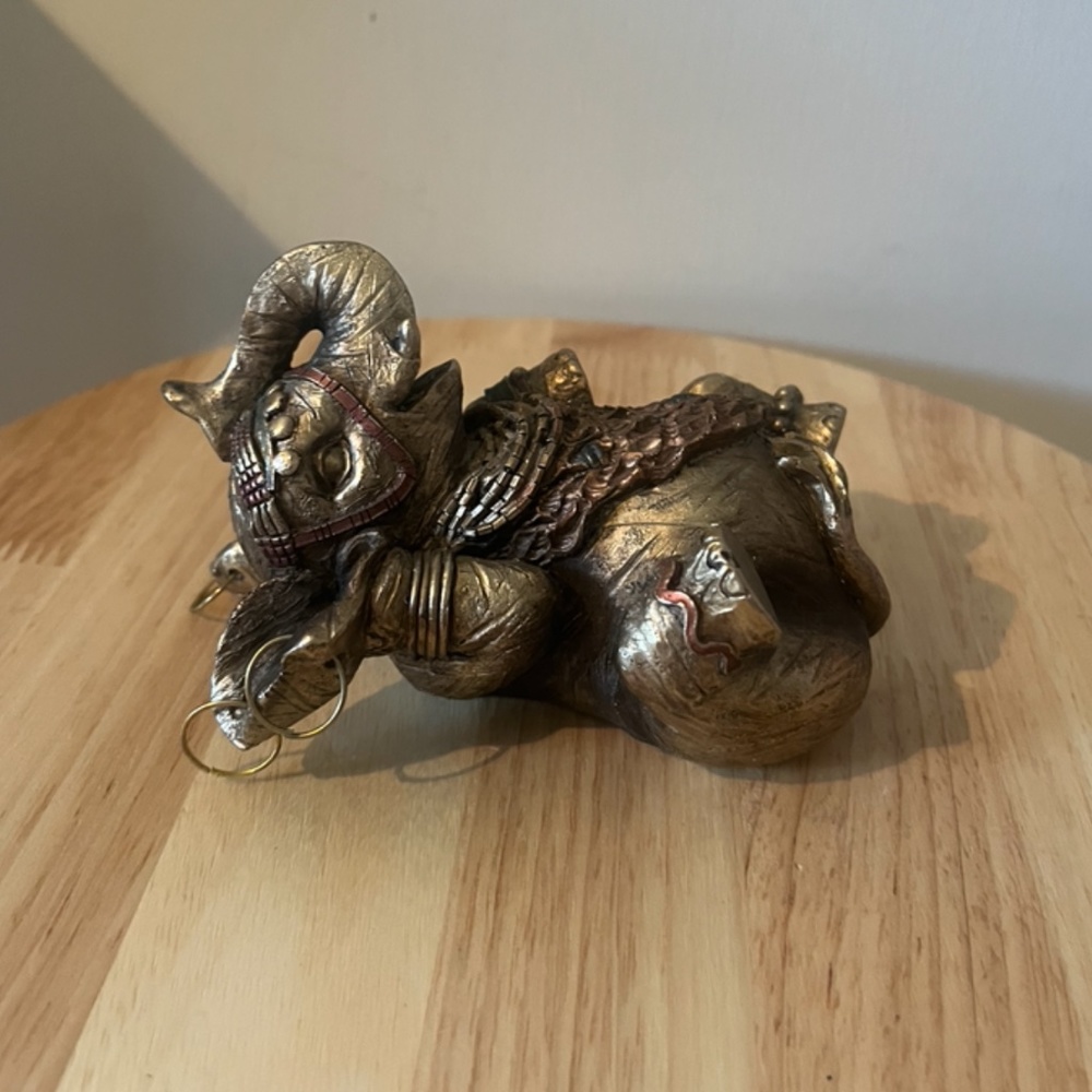 Vintage elephant sitting on its back statue decor EUC